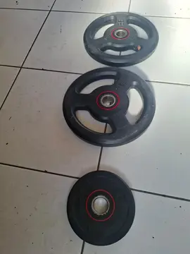 poids (5 kg. X2) et 2,75kg