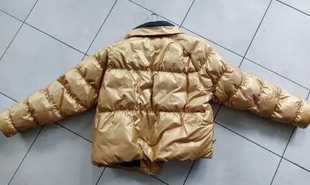 veste dorée Nike taille S (oversize)