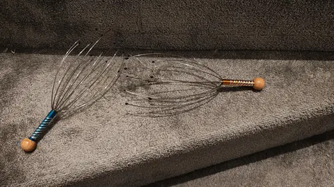 Gratte-gratte à cheveux