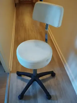 chaise haute a roulettes