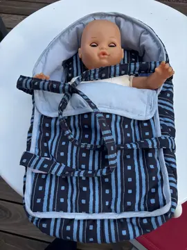 poupon dans son couffin