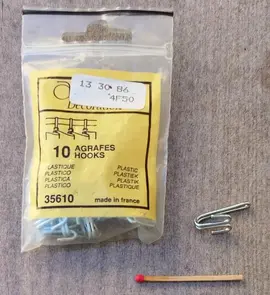 attaches métalliques pour rideaux