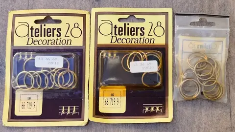 anneaux métalliques dorés pour rideaux
