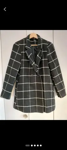 manteau noir rayé blanc t.1
