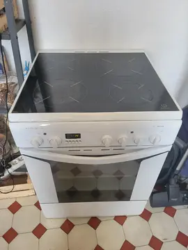 Réservée - Cuisinière 4 feux