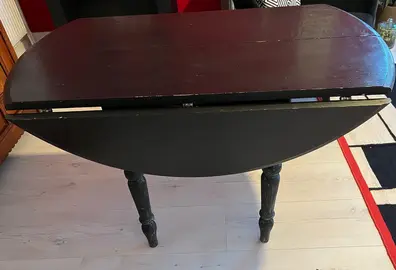 table ronde en bois noire