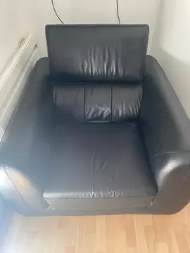 fauteuil en cuir TBE