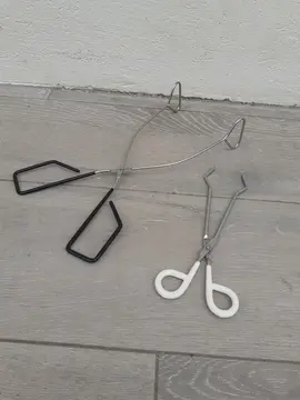 Pinces pour saisir les biberons en verre