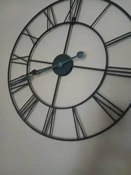 pendule 6o cm de diamètre fer forgé