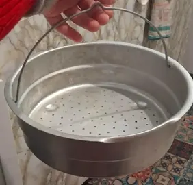 Panier cuison a vapeur mesurant 24 cm de diametre et hauteur 8 cm