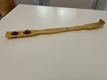 bâton à gratter