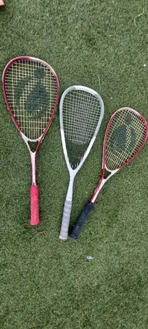 3 raquettes squash
