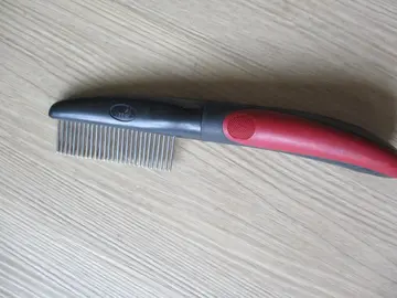 Peigne pour chien avec manche