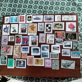 donne timbres n45 étrangers 1lot par envoie