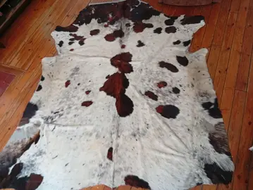 véritable tapis en peau de vache