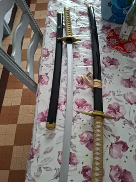 Lot de 2 sabres plastique dur et corde