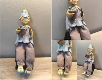 URGENT garçon bleu avec son sceau et son râteau