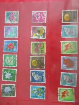 18 timbres obli. Japon - fleurs et poissons