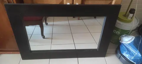Miroir encadrement bois foncé