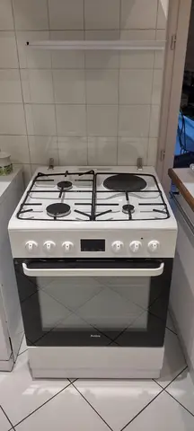 cuisinière gaz + four élec