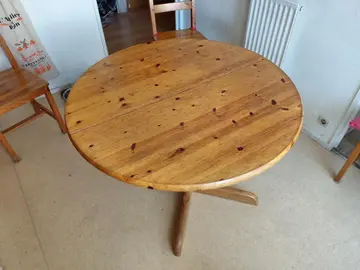 table en bois ronde avec deux rallonge