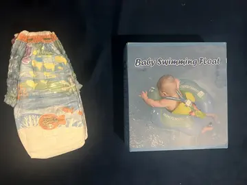 Bouée bébé + couches de bain