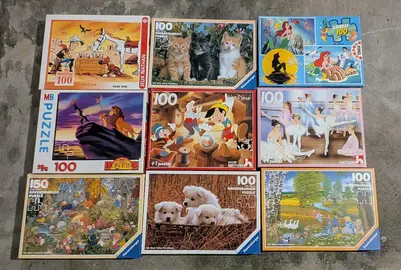 8 Puzzles 100 pièces et 1 de 150 pièces