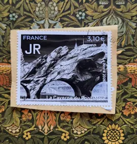 Timbre oblitéré La caverne du Pont-Neuf par JR