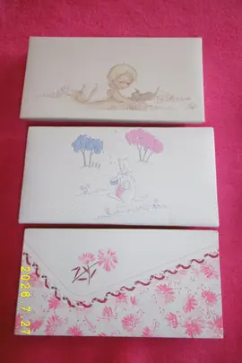 boîtes pour dragées de baptême