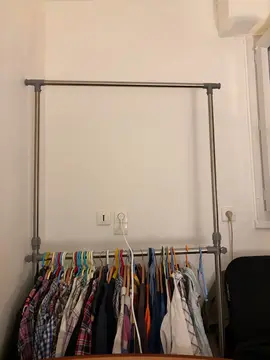 portant vêtements double niveau très bon état