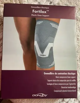 Genouillère de contention élastique