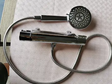 Robinet mitigeur douche et poire