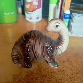 Petit Dinosaure (deco) en porcelaine.