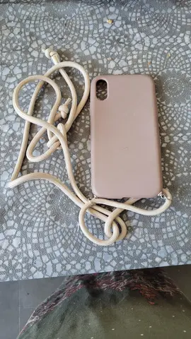 coque téléphone avec cordon (je ne sais pas trop lequel)🤷 ♀️