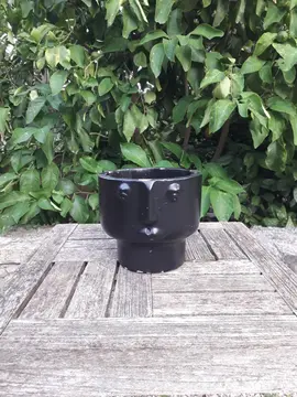 cache pot en forme de tête